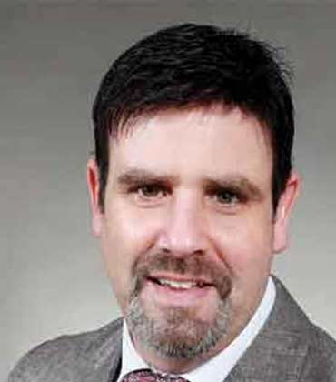 Guy J. Ofek