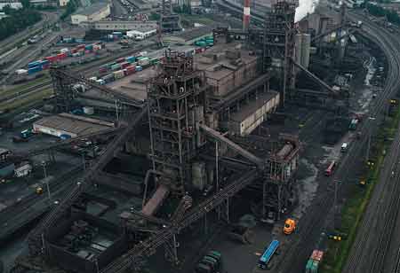Adaptation and Innovation in Large-Scale Manufacturing
